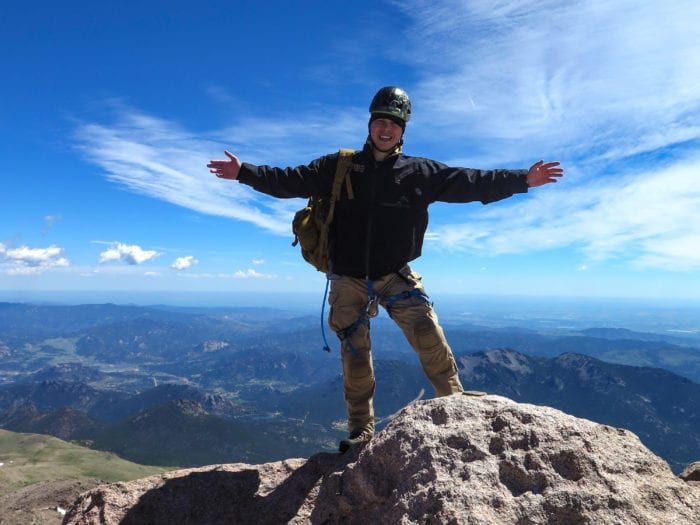 Climber celebrating at summit 