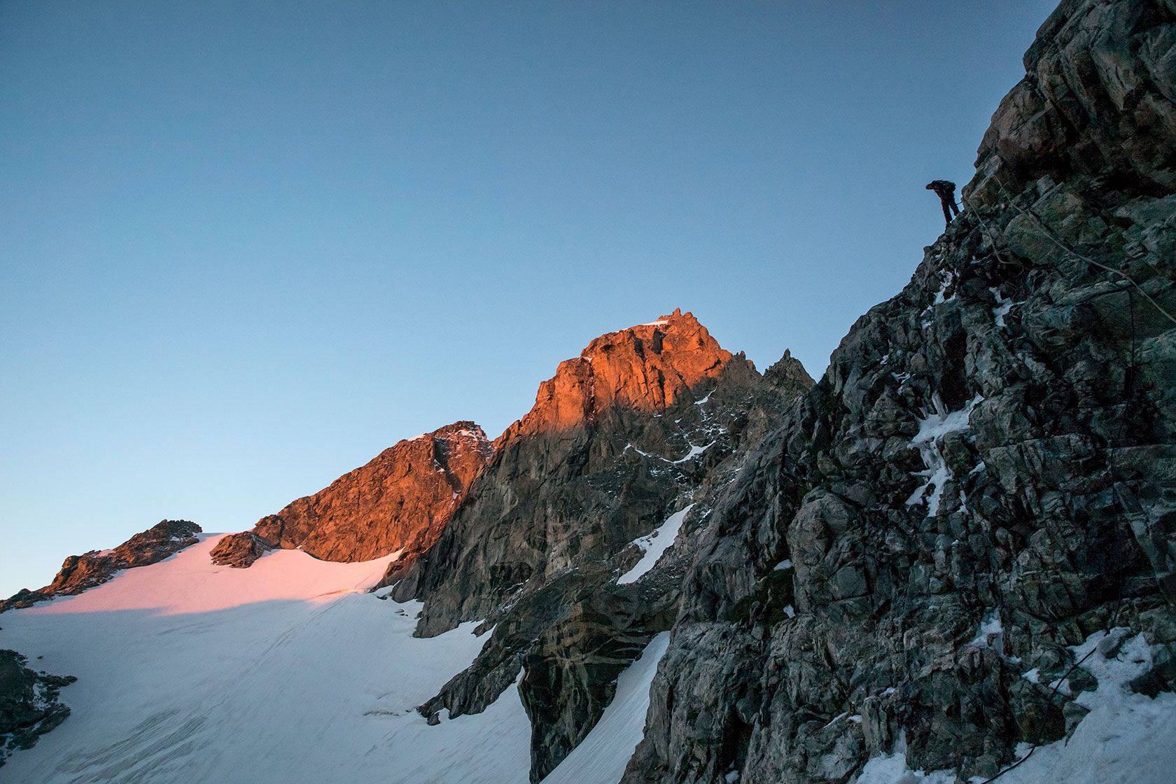 A climber ascends the Grand Teton with The Mountain Guides