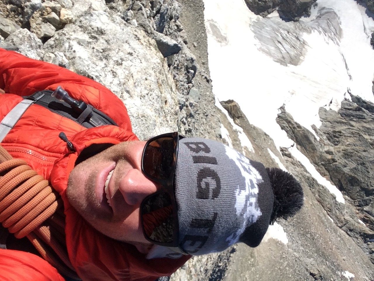 Selfie of climber in snowy mountains