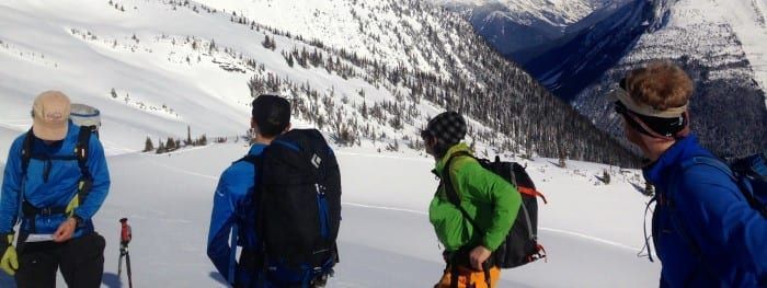 Team going up a snowy mountain