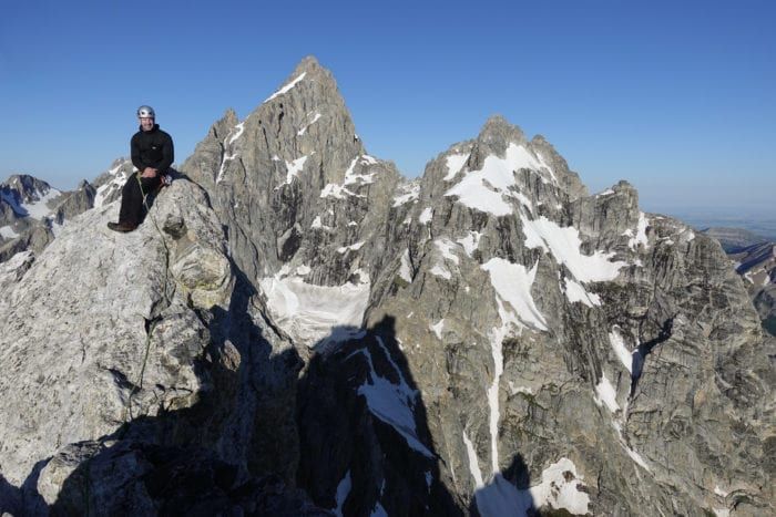 Climber at the summit of Tetons 