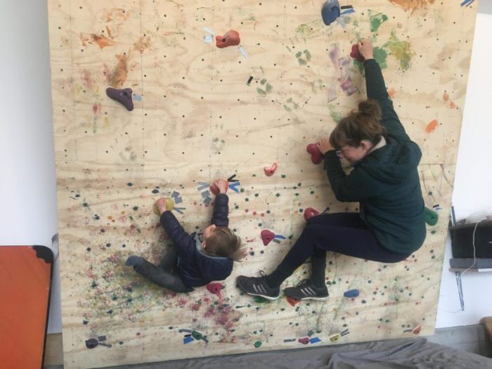 Children on rock climbing wall