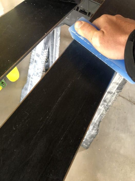 Person waxing their skis 
