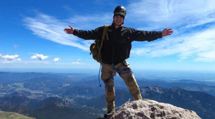 Person at top of Longs peak