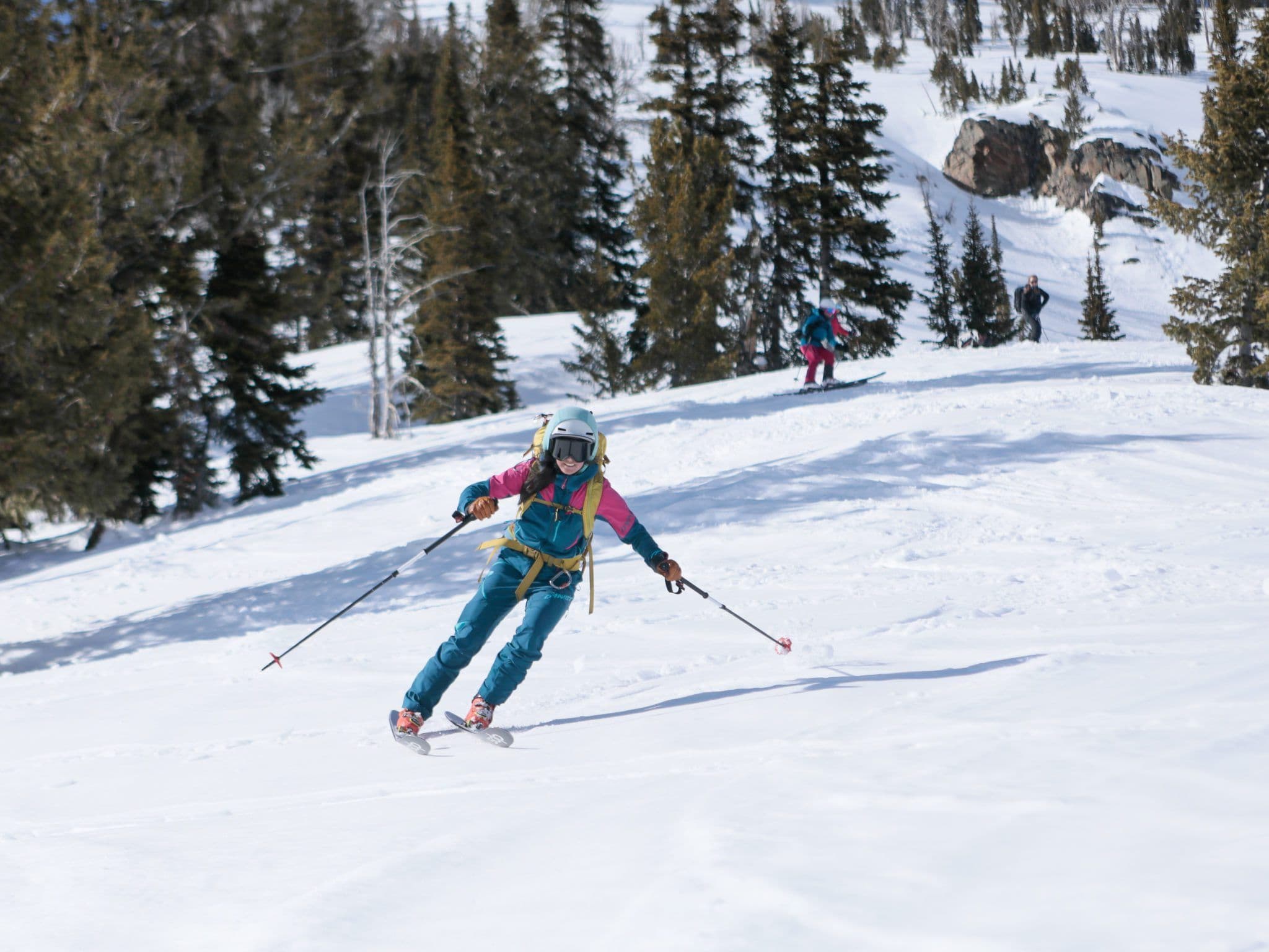 Women skiing down a mountain