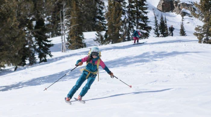 Woman skies down mountain