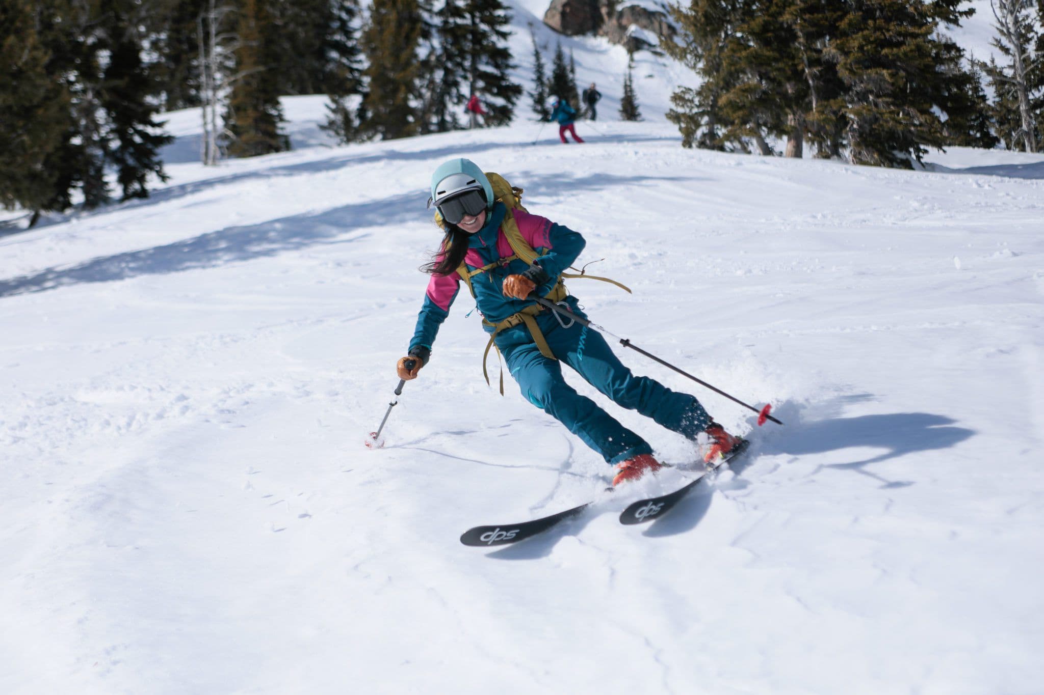 Women skiing down a mountain in Grand Teton national park