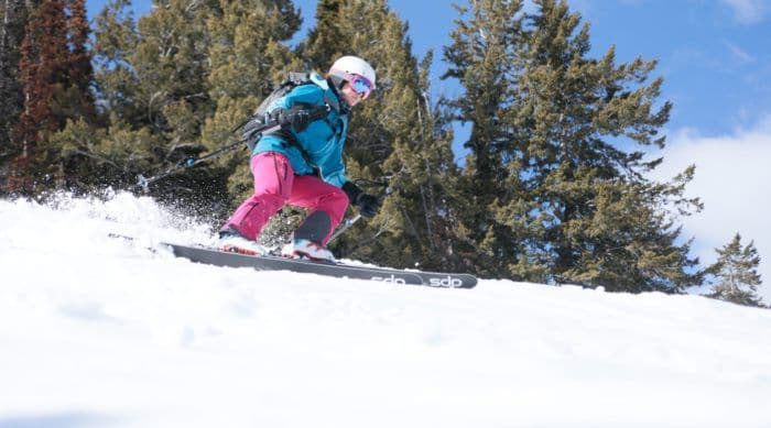 Women carves down mountain