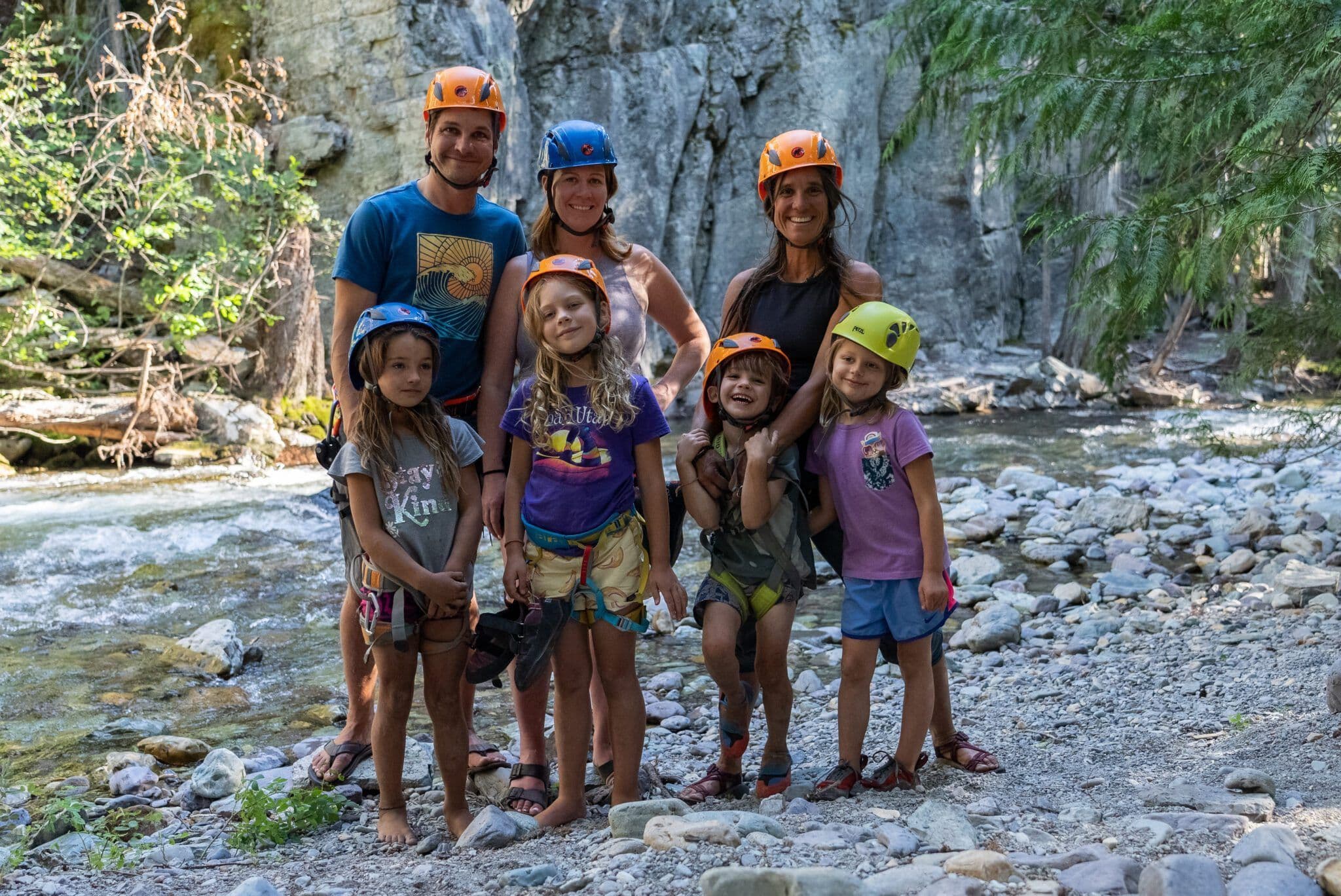 Family near a rocky stream