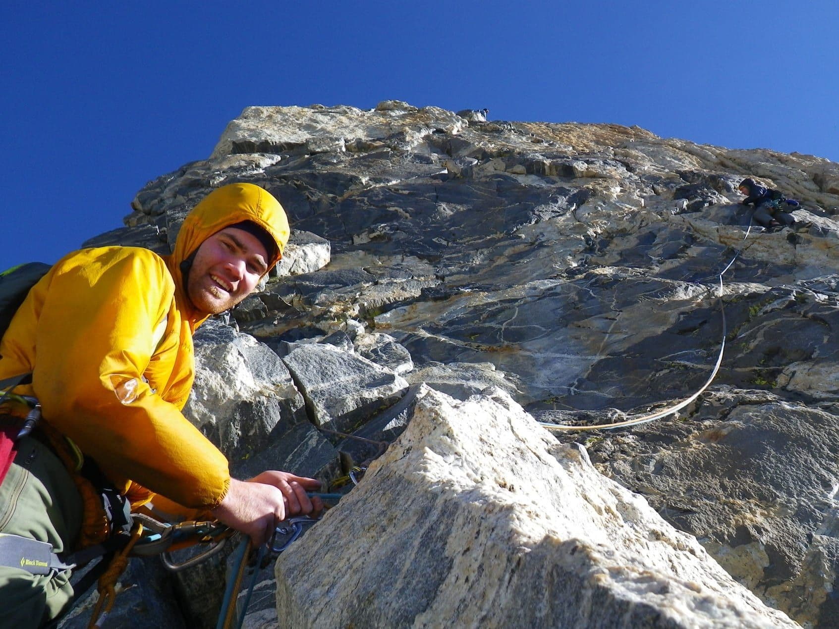 Happy person climbing to summit of Grand Teton 
