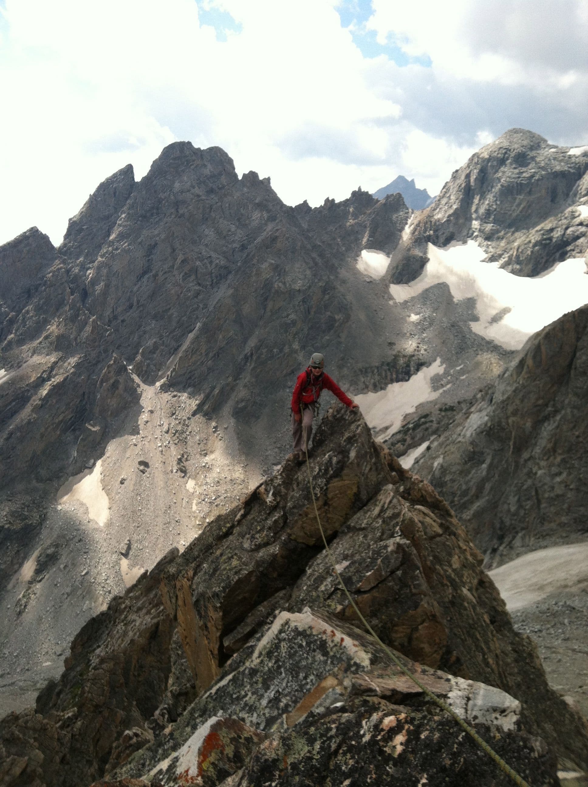 Climber navigating rocky terrain 