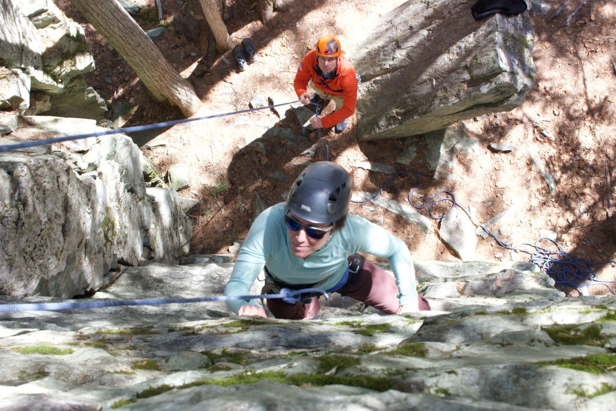 Women rock climbing