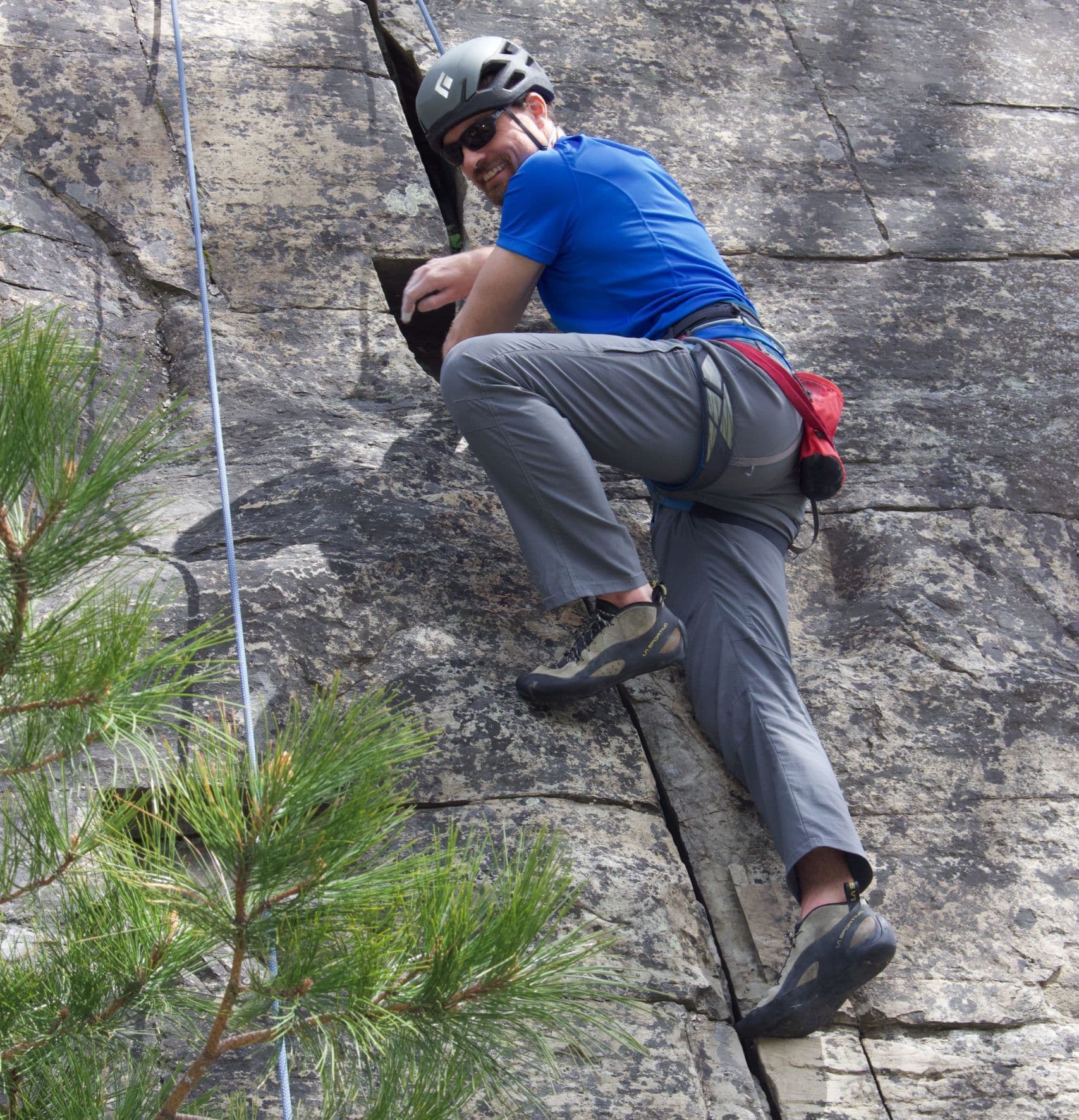 Man climbing a mountain