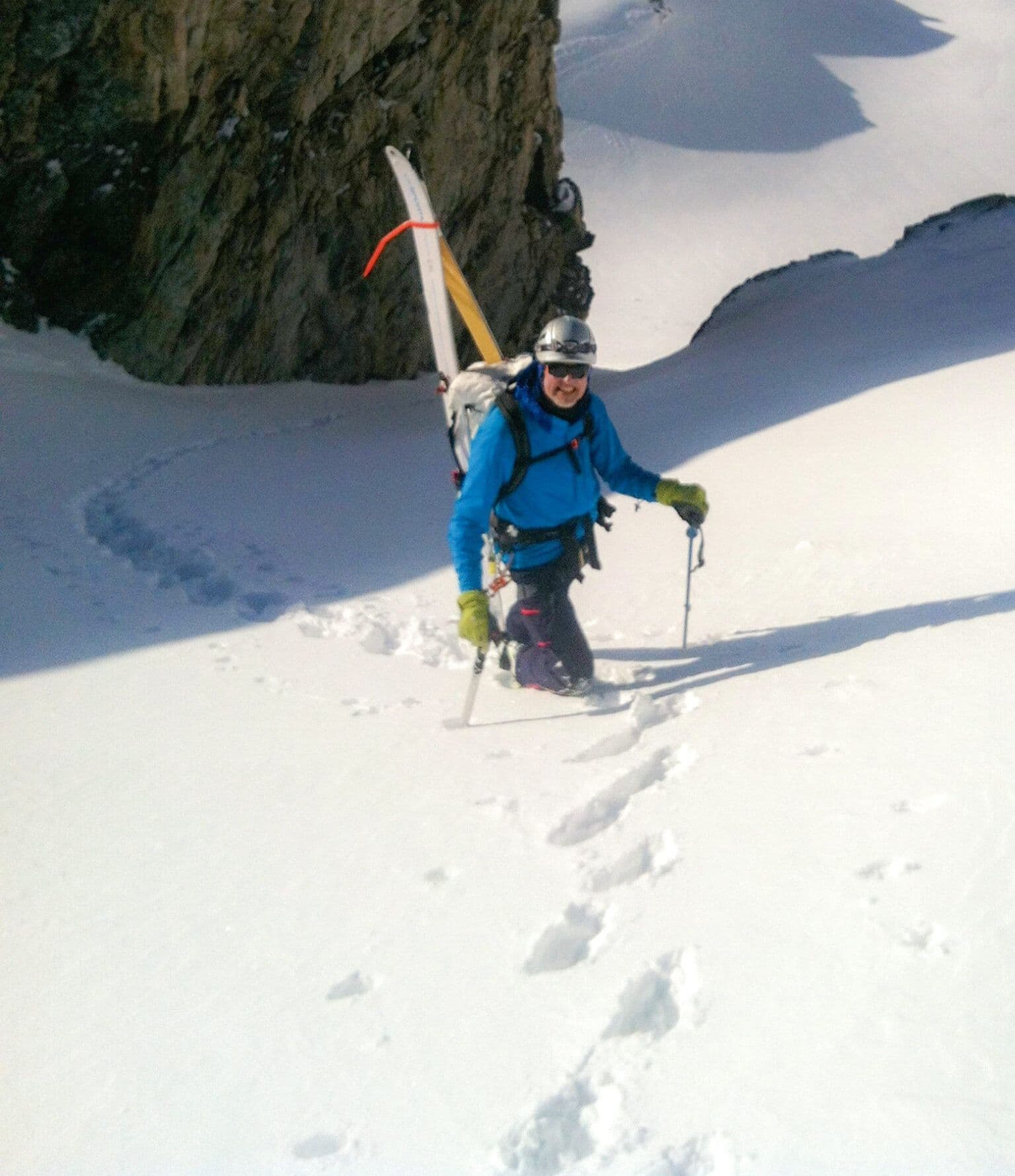 A man mountaineering in deep snow