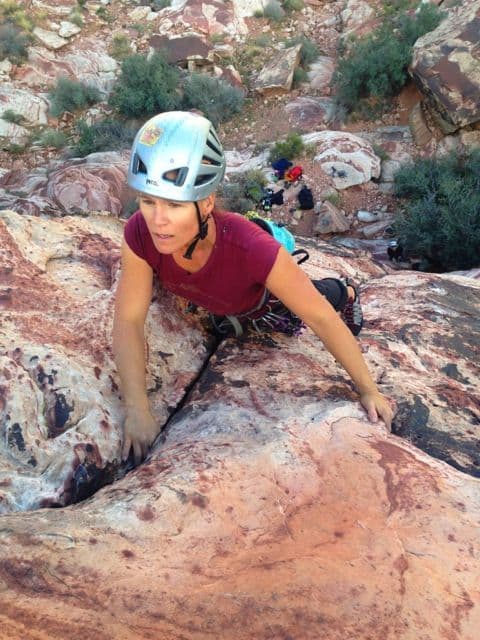 Women rock climbing