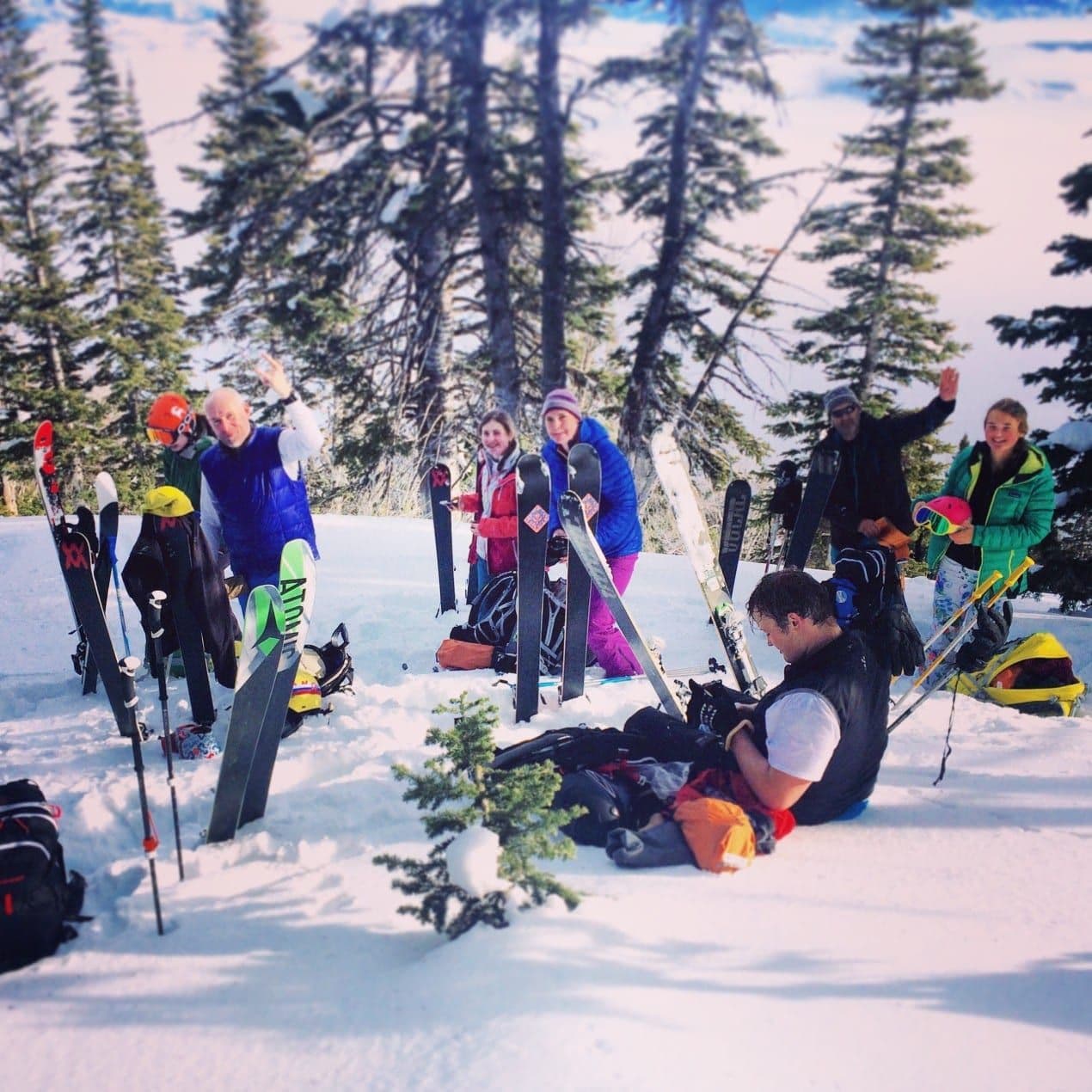 Team of skiers taking a group photo 
