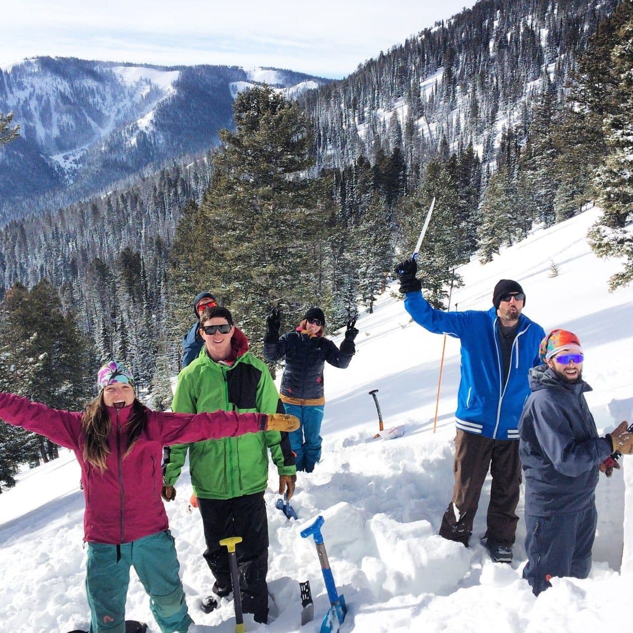 Group photo of skiers celebrating 