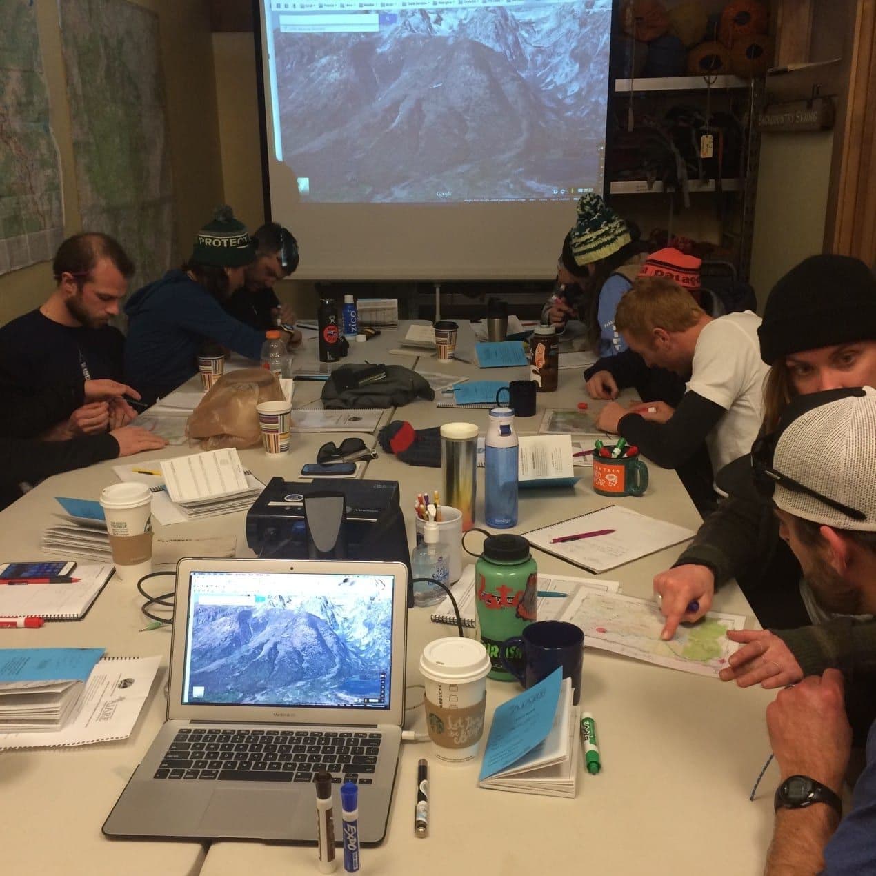Group of people analyzing terrain