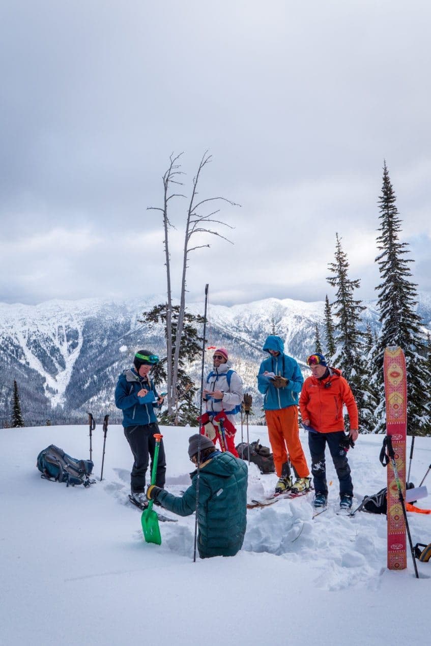 Skiers in deep snow