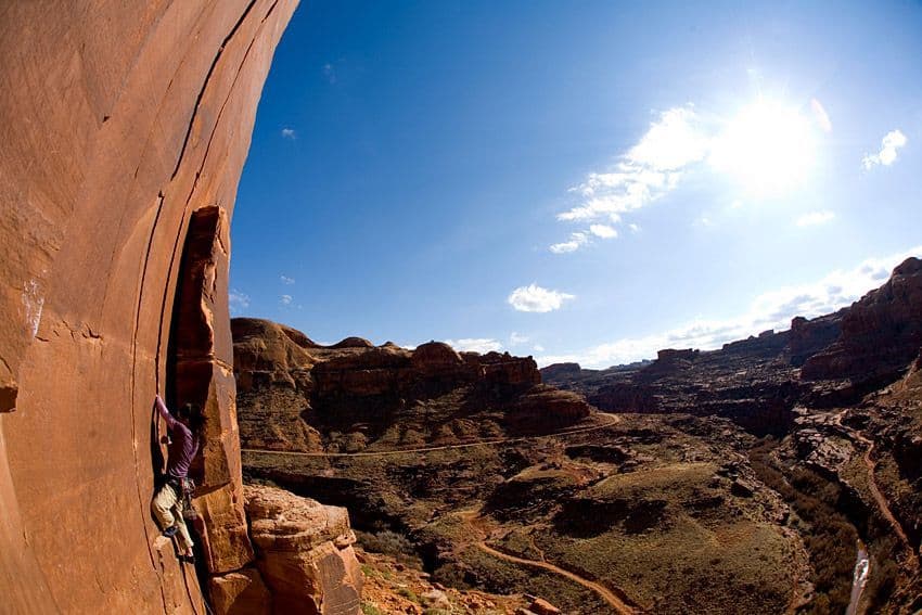 Person rock climbing in Moab Utah