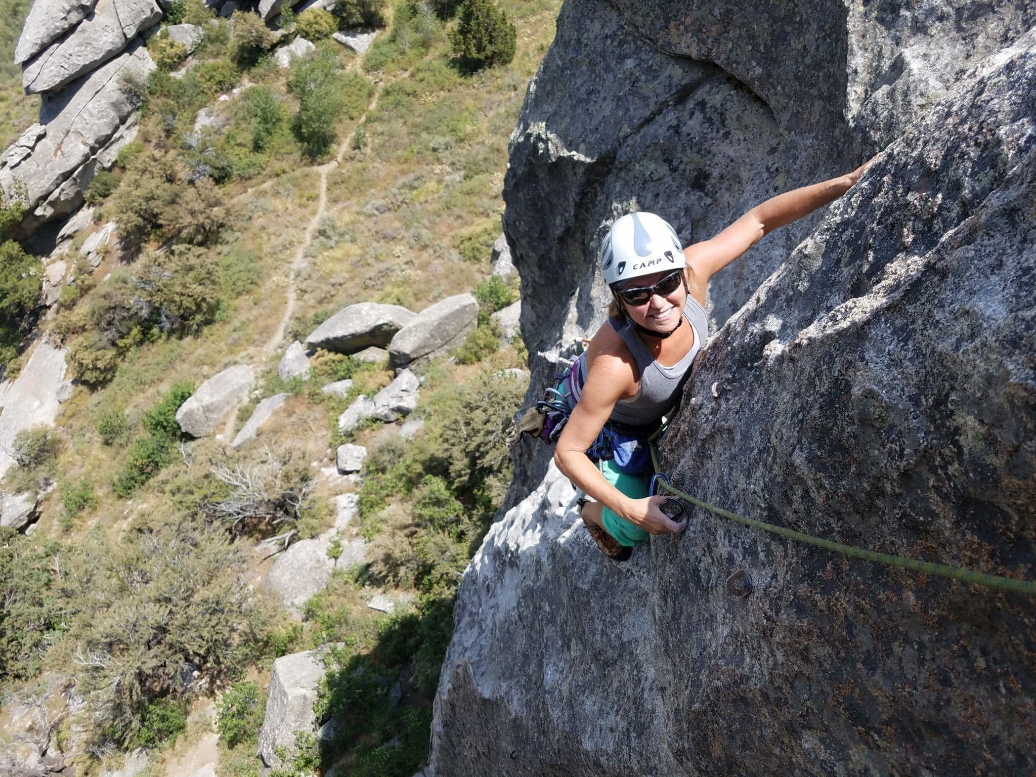 Woman climbing in city of rocks 