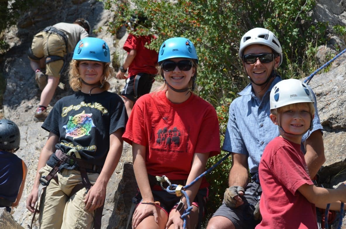Kids learning to rock climb