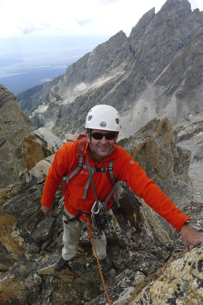 Man rock climbing in Grand Teton national park 