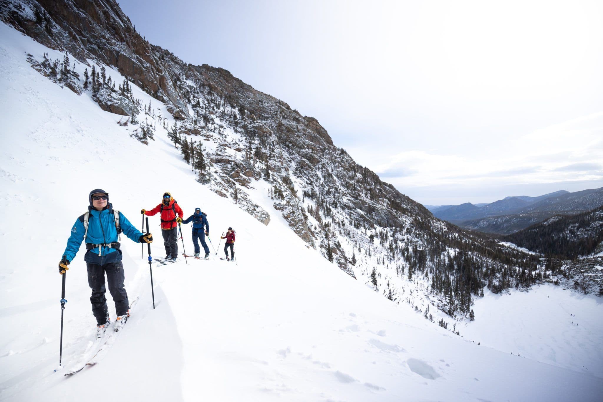 Skiers hiking in powder 