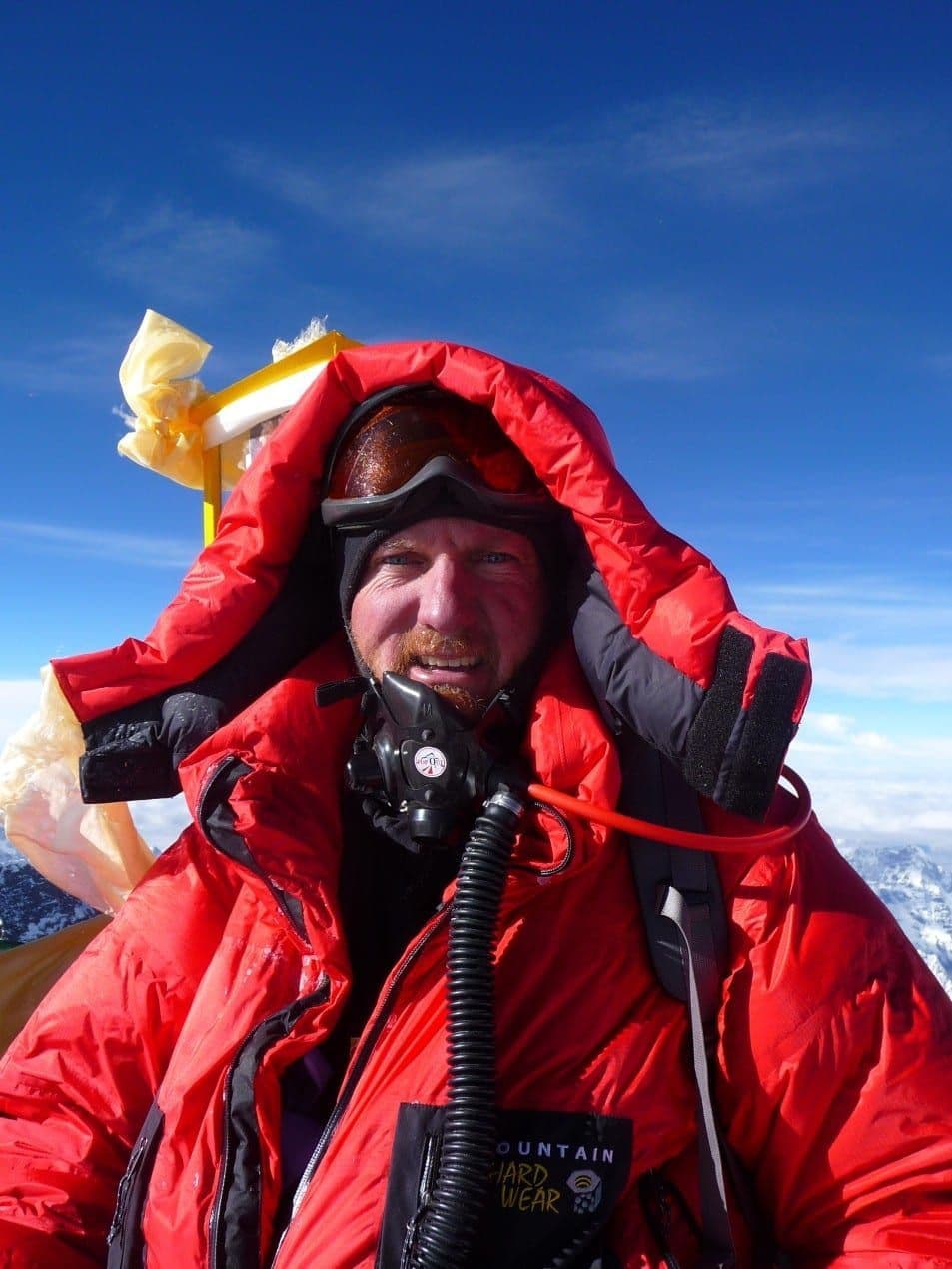 Climber at summit of Mount Everest