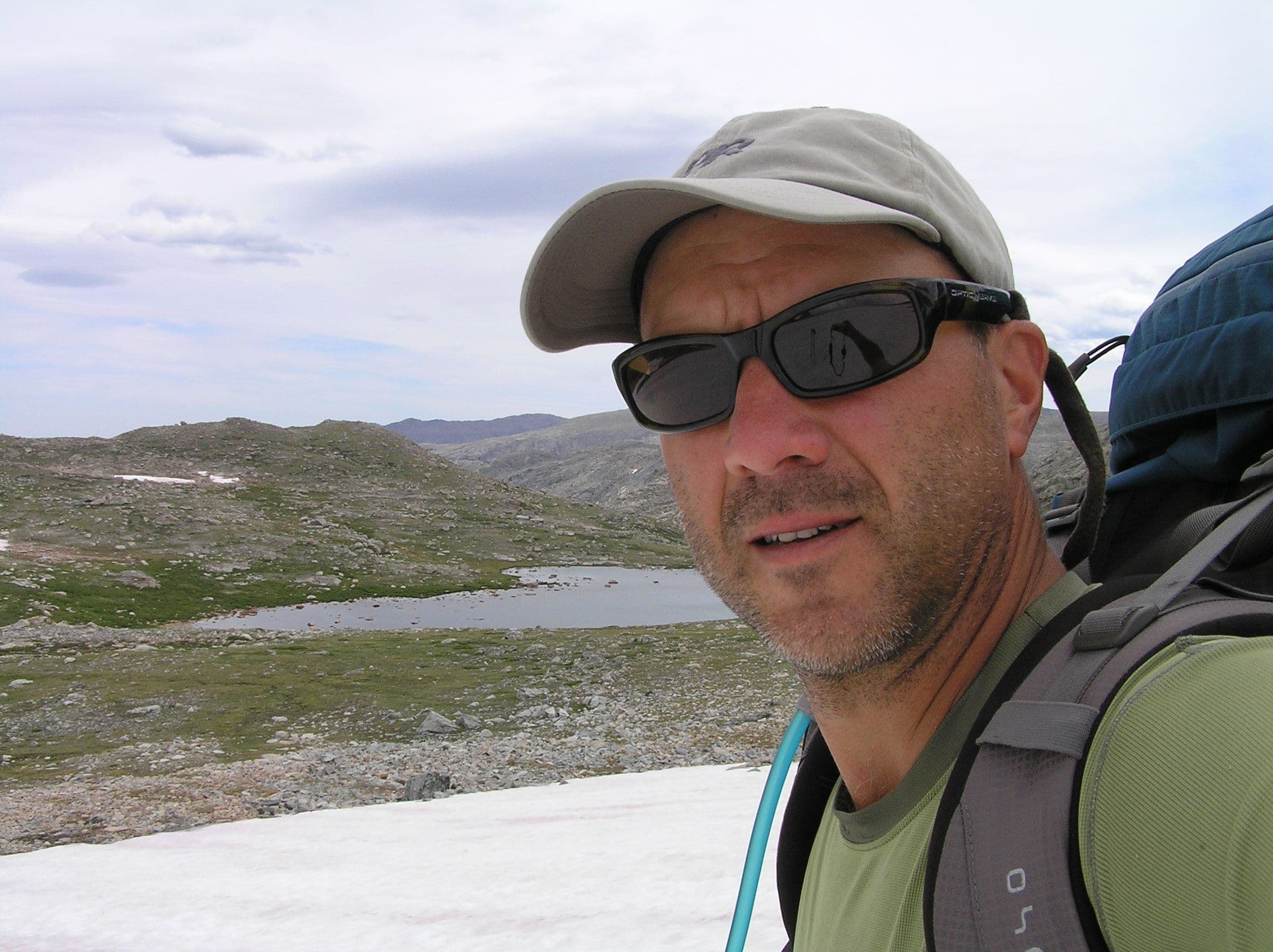 Selfie of a man with mountains 