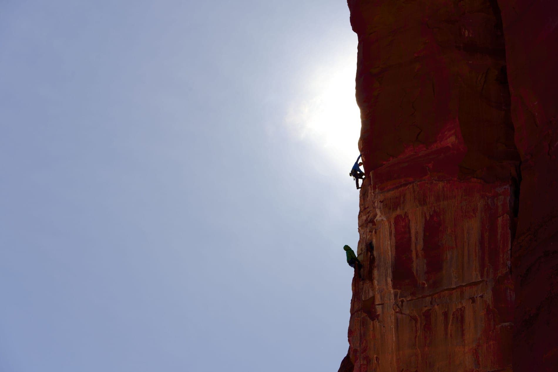 People climbing in Moab Utah