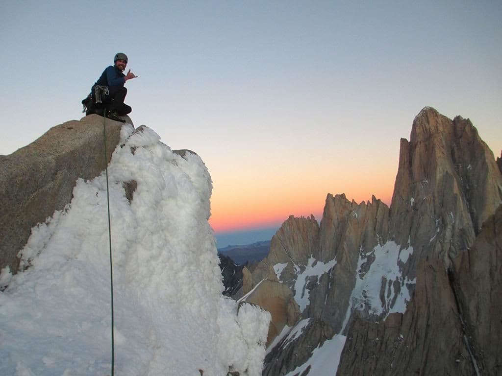 Hiker at summit during summit 