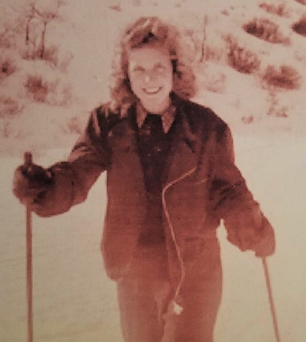 Woman hiking in the snow