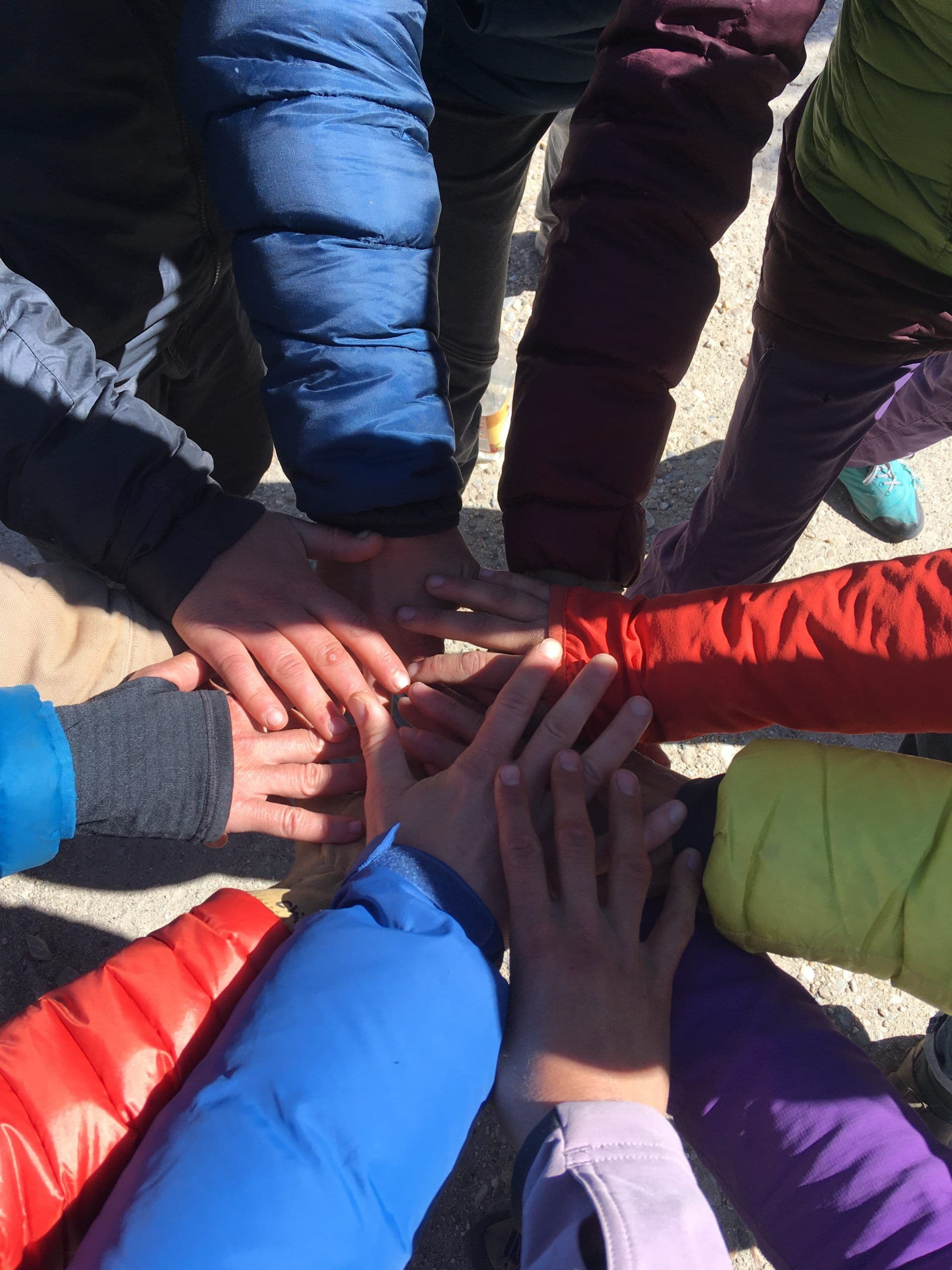 Group of hands together to show teamwork