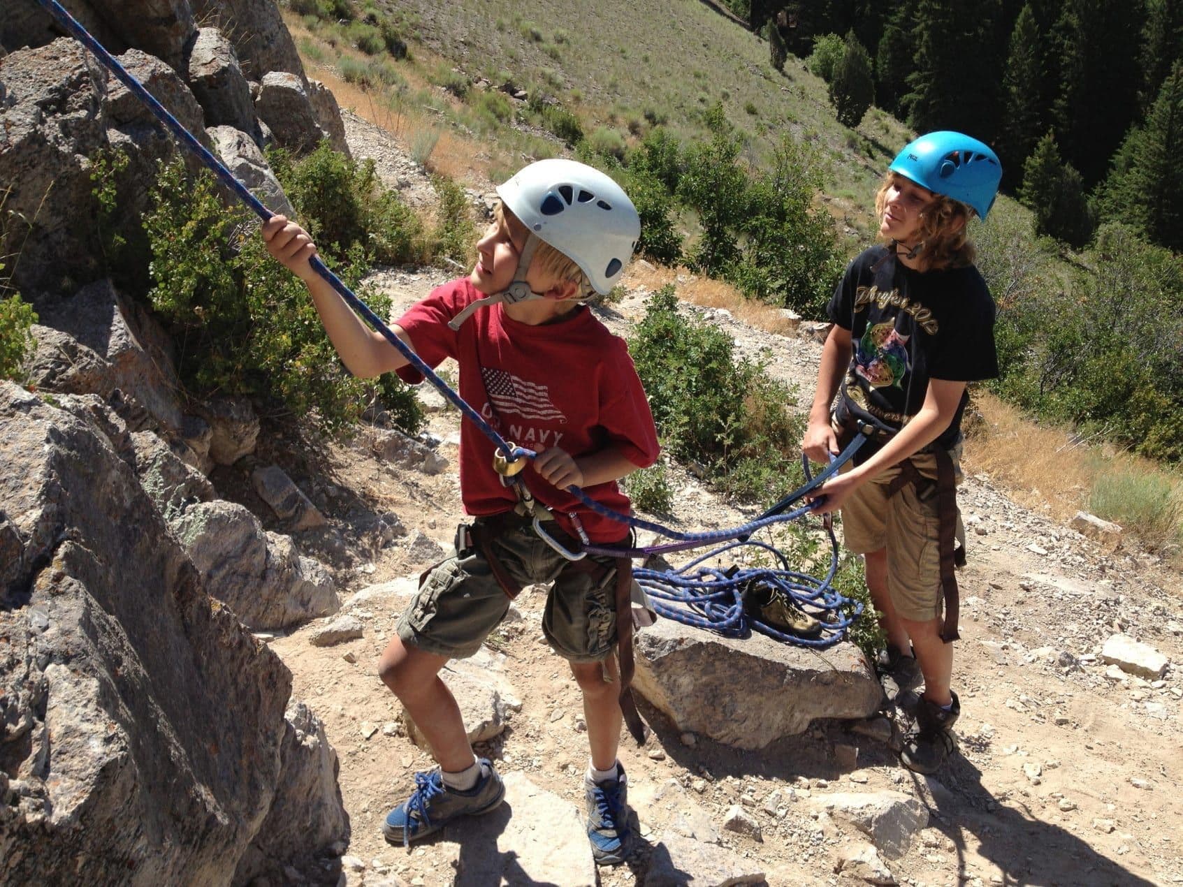 Kids preparing to rock climb