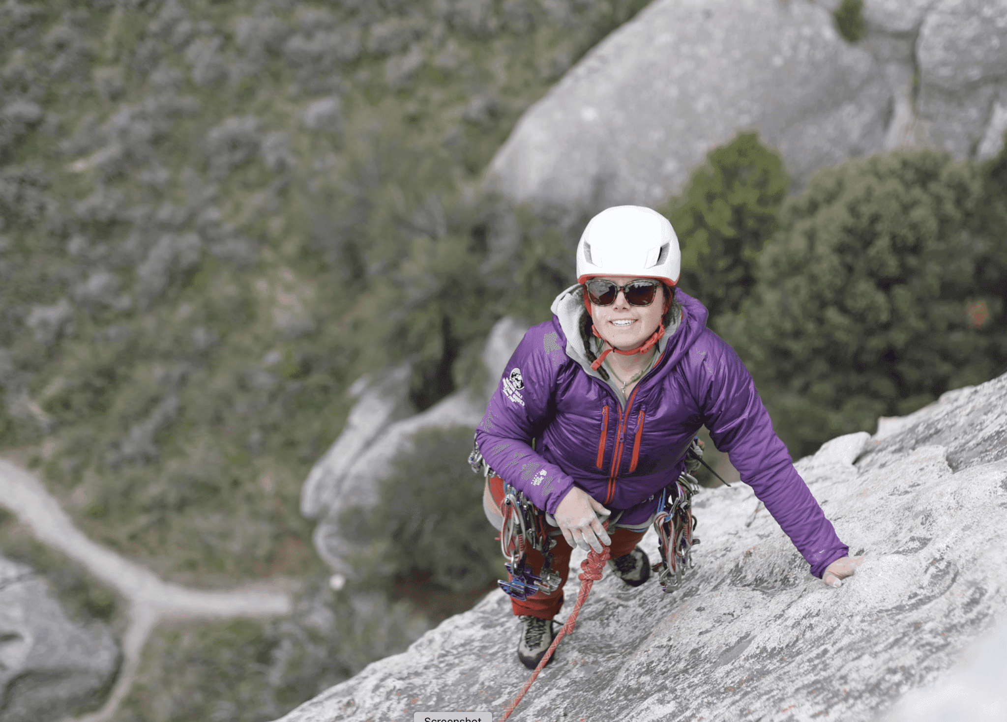 Woman climbing in city of rocks