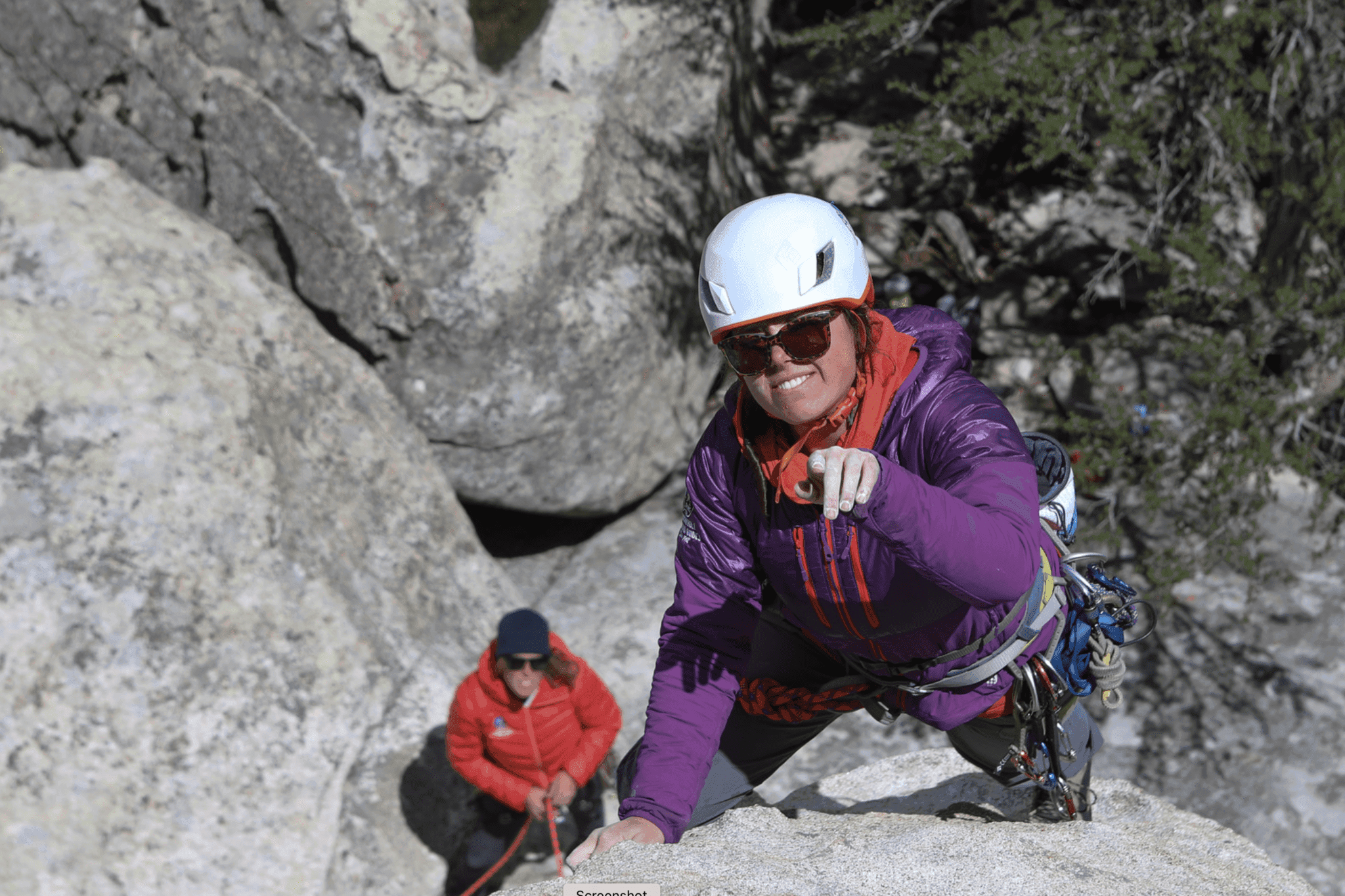 Woman mid climb in city of rocks