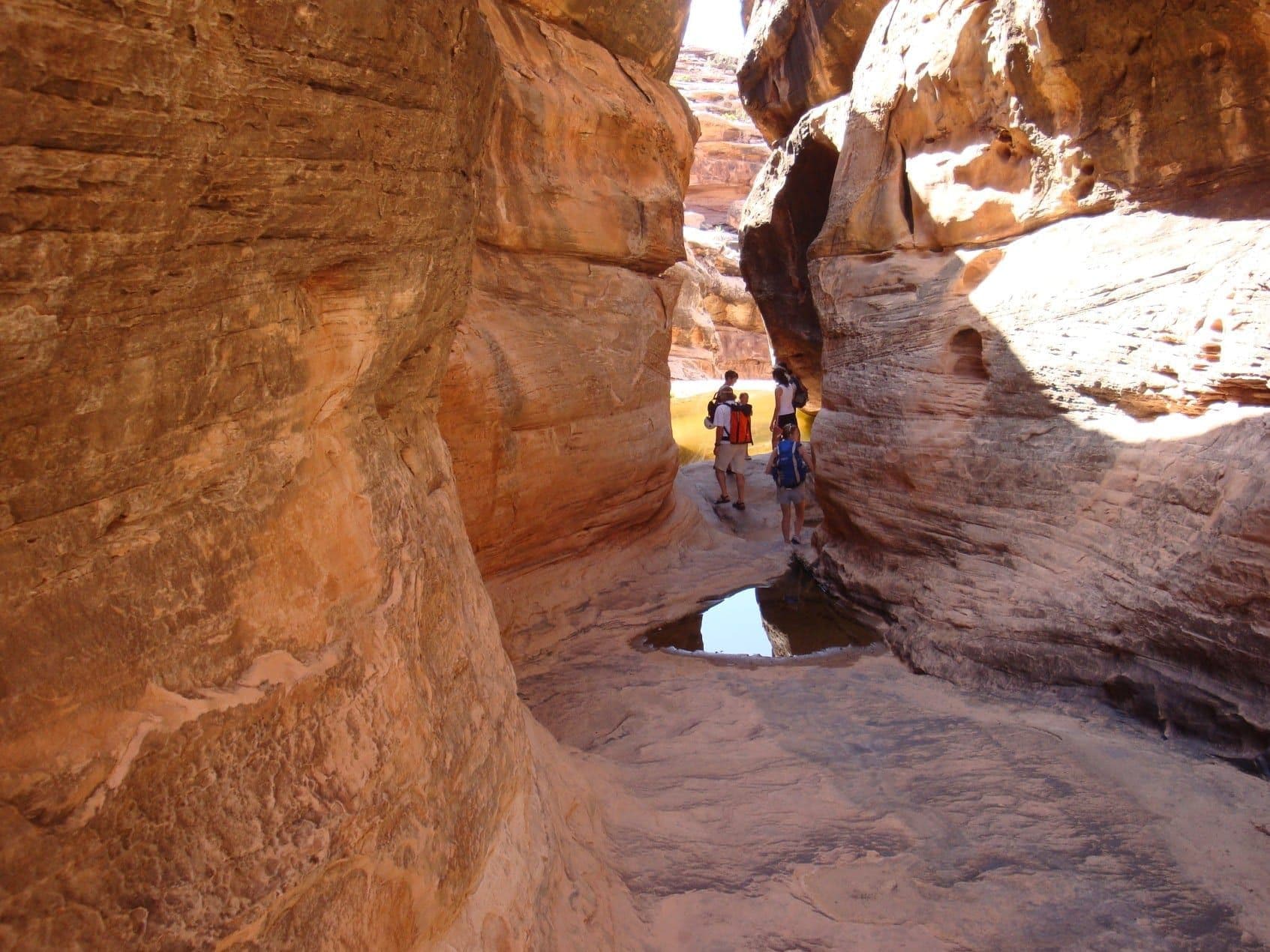 Group of people exploring a canyon