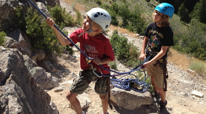 two kids during rock climbing course