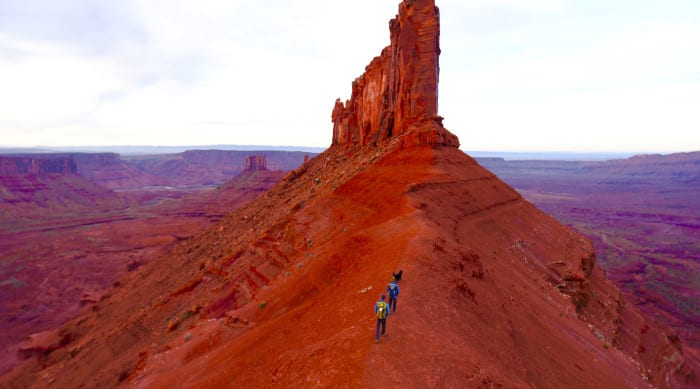 hiking up to one of moab's towers