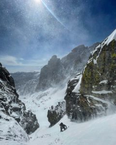 Ski mountaineer ascends a couloir in Rocky Mountain National Park.