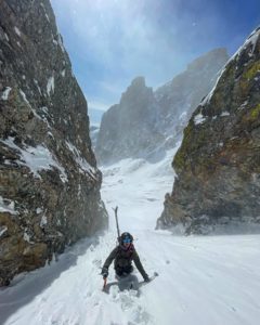 Ski mountaineer book packs up a couloir in Rocky Mountain National Park.
