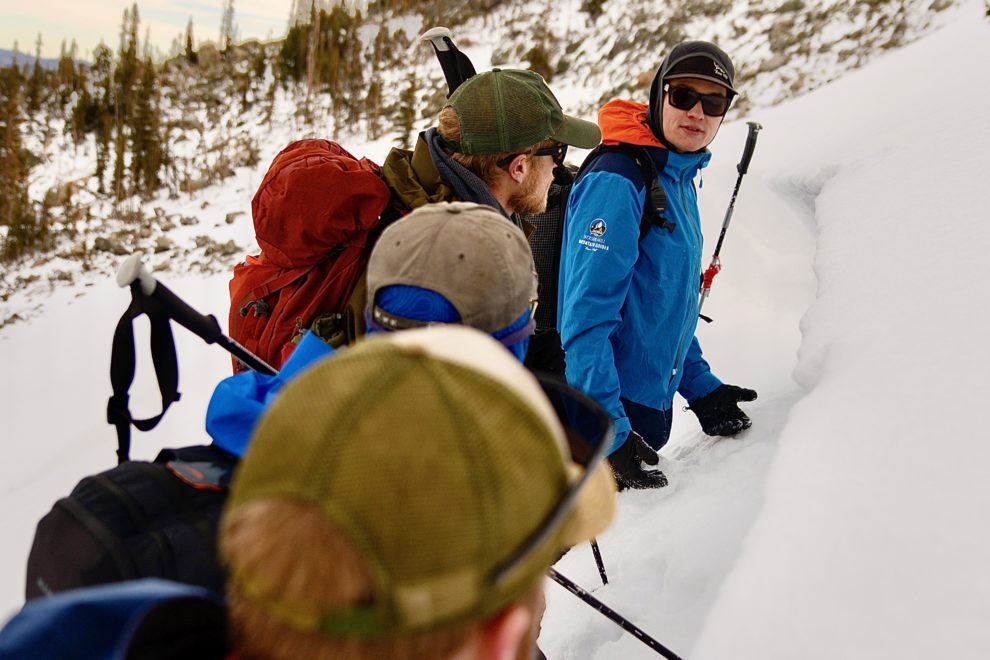 Avalanche instructor teaches three students in Rocky Mountain National Park.