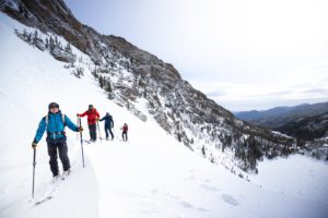 Four backcountry skiers skinning in Rocky Mountain National Park.