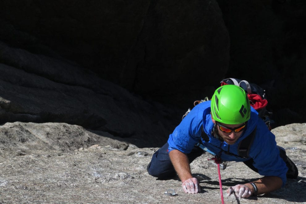 male rock climbing in colorado