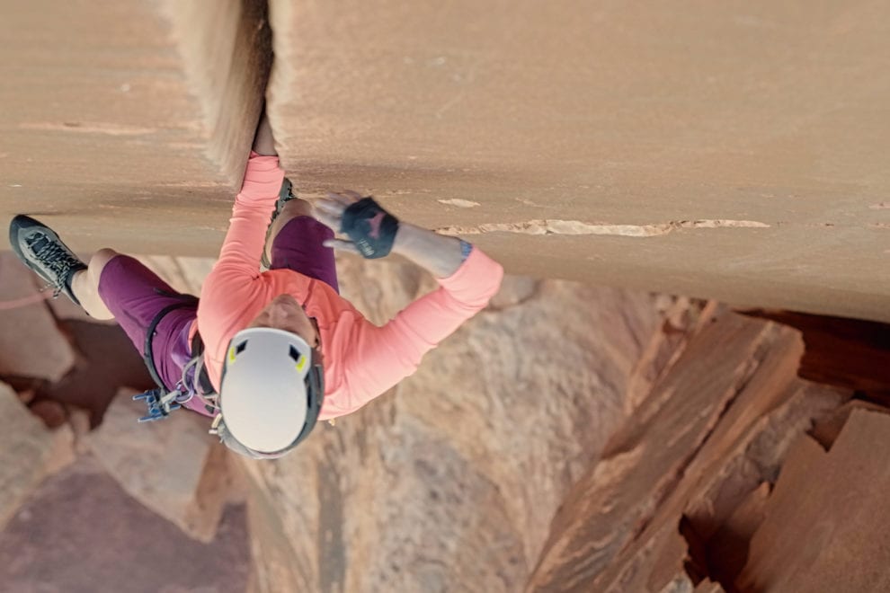a women crack climbing