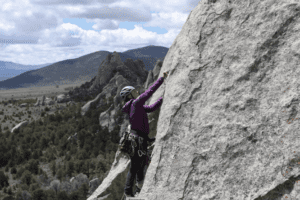 women rock climbing