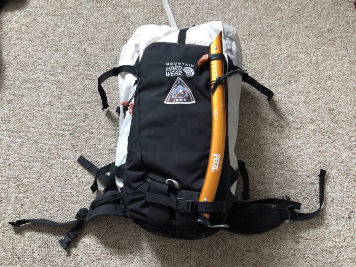 The Mountain Hardware Snoskiwoski ski mountaineering backpack and a yellow ice axe